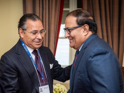 Chairman Kamel Ghribi; S. Iswaran, Minister for Communications and Information, Singapore.